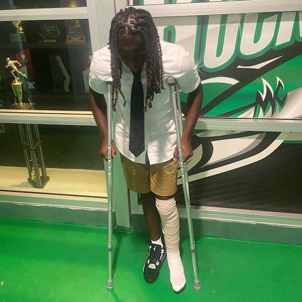 Amari Wallace uses crutches after surgery.